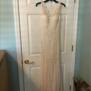 Beige gown with sequin and lace detail.